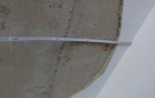 Ausmessen eines Bauschadens